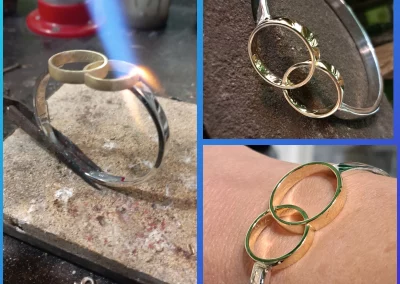 Gouden trouwringen in zilveren armband verwerkt