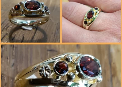 Gouden trouwring verandert met granaatje