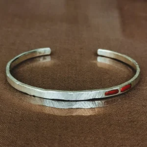 TAJ,Zilveren herenarmband met rode steen Abel